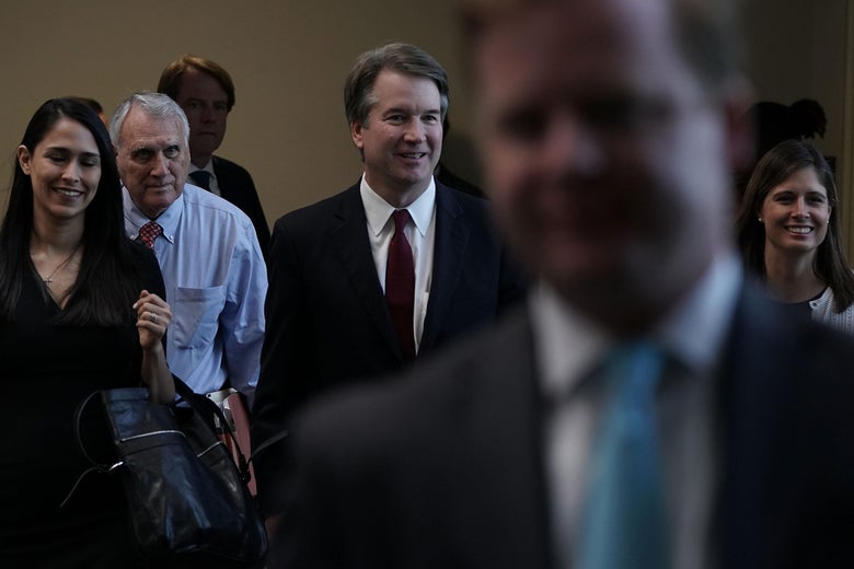 Brett Kavanaugh walking to a meeting.